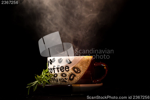 Image of Steaming hot cup of coffee