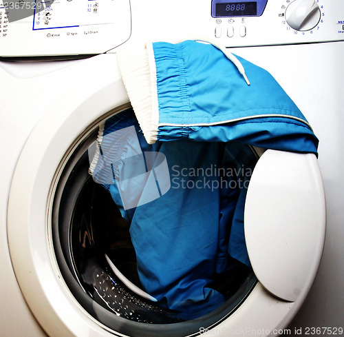 Image of Trousers and laundry.