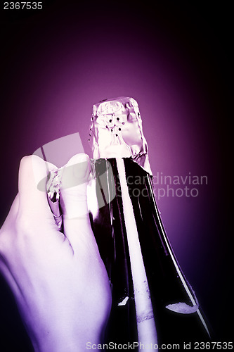 Image of Opening champagne bottle