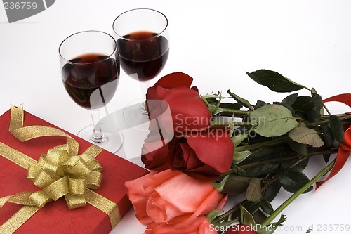 Image of Roses With Present And Wine