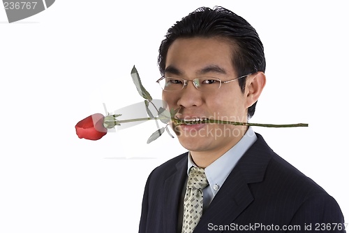 Image of Holding Rose In Mouth
