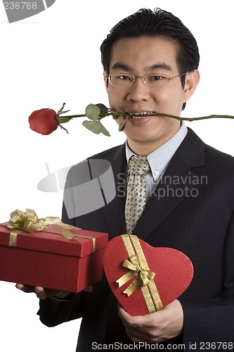 Image of Holding Rose In Mouth