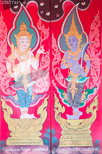 Image of traditional thai art of painting on the door of Thai temple