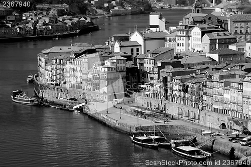 Image of Portugal. Porto city. View of Douro river embankment  in black a