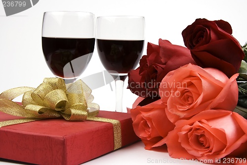 Image of Roses With Present And Wine