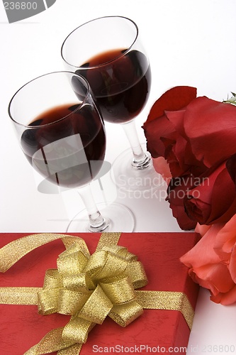 Image of Roses With Present And Wine