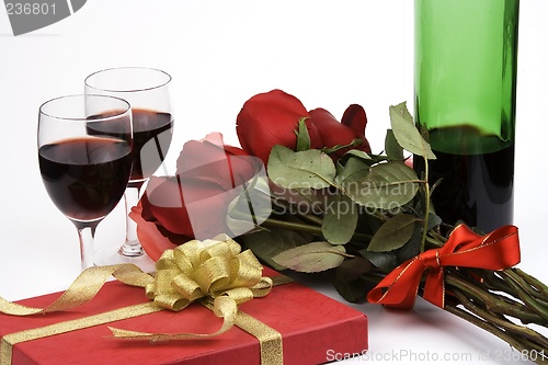 Image of Roses With Present And Wine