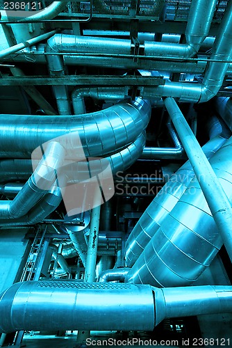 Image of Industrial zone, Steel pipelines and valves in blue tones