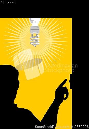 Image of Man Switching On Lighting Bulb