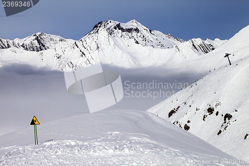 Image of Warning sing on ski slope