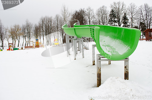 Image of outdoor water park slide snow winter playground 