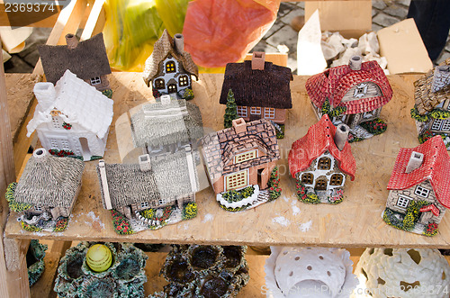 Image of handmade decorative clay houses fair market event 