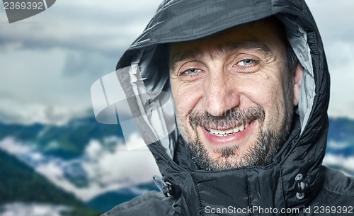 Image of Man after climbing on the mountain