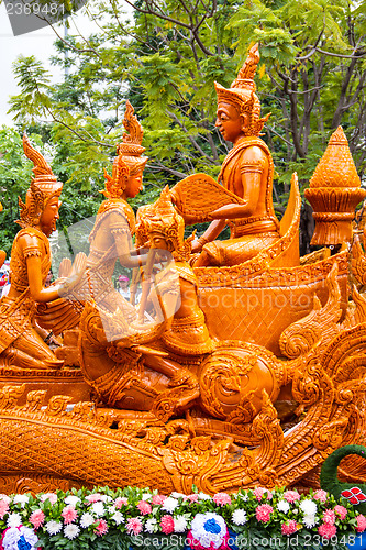 Image of Carving a large candle, Thai art form of wax at Ubonratchathani 