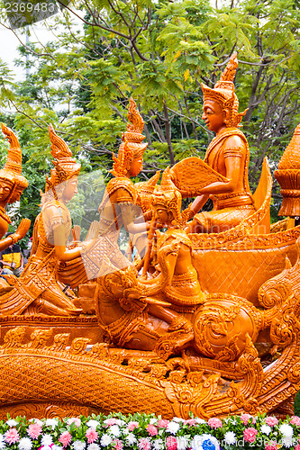 Image of Carving a large candle, Thai art form of wax at Ubonratchathani 