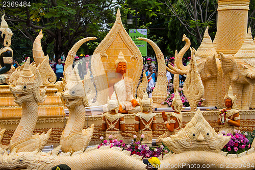 Image of Carving a large candle, Thai art form of wax at Ubonratchathani 