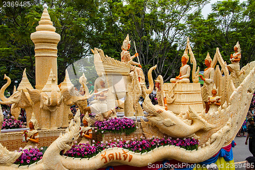 Image of Carving a large candle, Thai art form of wax at Ubonratchathani 