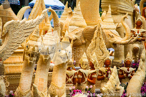 Image of Carving a large candle, Thai art form of wax at Ubonratchathani 