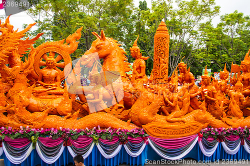 Image of Carving a large candle, Thai art form of wax at Ubonratchathani 