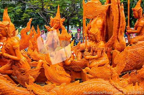 Image of Carving a large candle, Thai art form of wax at Ubonratchathani 