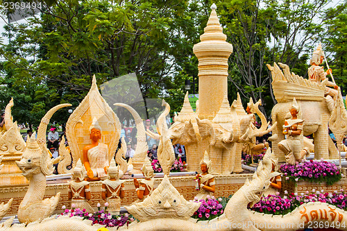 Image of Carving a large candle, Thai art form of wax at Ubonratchathani 