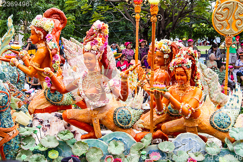 Image of Carving a large candle, Thai art form of wax at Ubonratchathani 