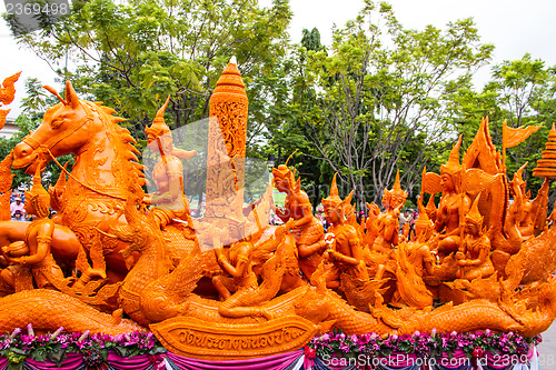 Image of Carving a large candle, Thai art form of wax at Ubonratchathani 