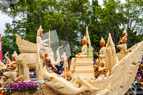 Image of Carving a large candle, Thai art form of wax at Ubonratchathani 