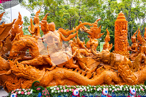 Image of Carving a large candle, Thai art form of wax at Ubonratchathani 