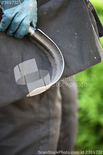 Image of Curved scraping tool for cleaning a chimney flue