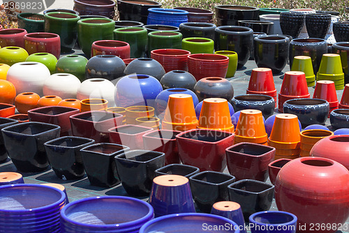 Image of Colorful ceramic pots in market