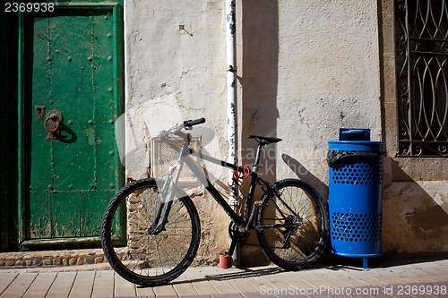 Image of old bicycle near the ancient walls