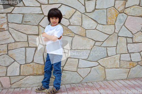 Image of boy in a white shirt