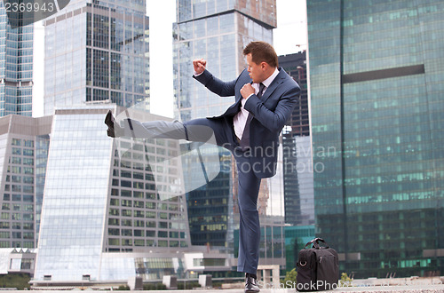 Image of businessman strikes