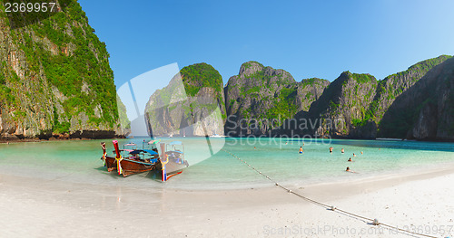 Image of Tropical beach with boats and rocks. Thailand, Phi Phi