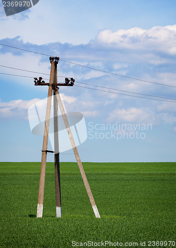 Image of Concrete pole - power lines in the field