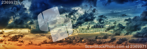 Image of Panoramic view of evening dramatic sky at sunset