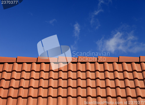 Image of Roof tiles against blue sky