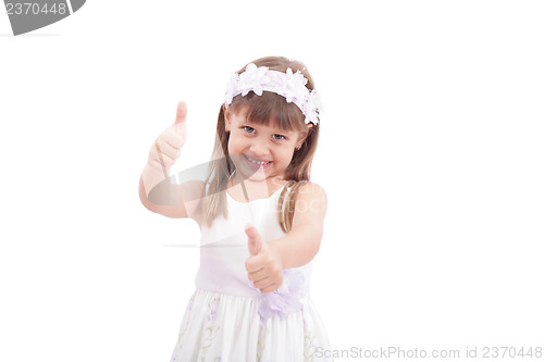 Image of happy pretty girl with thumbs up on white background 