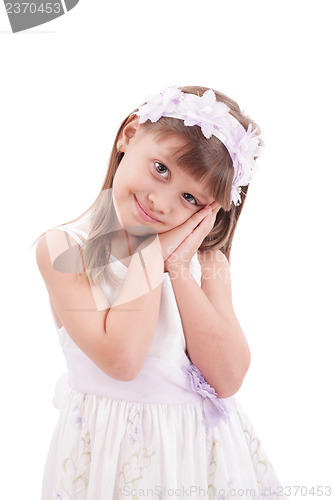 Image of happy smiling little girl on white background in studio 