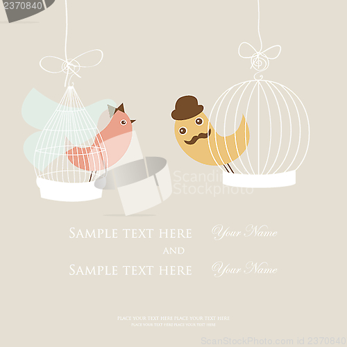 Image of Wedding invitation or bridal shower card with two cute birds in the cages.