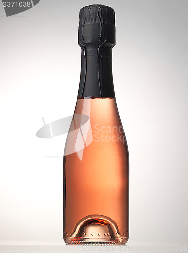 Image of bottle of pink sparkling wine