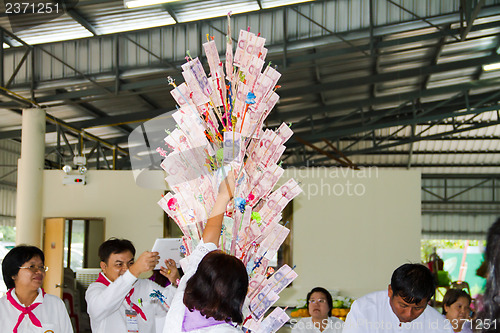 Image of UBONRATCHATHANI - JULY 28: "TOD PHA PA" Traditional of buddhist 