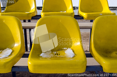 Image of beach volleyball yellow chairs  