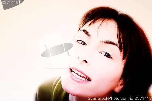 Image of Young woman in bed