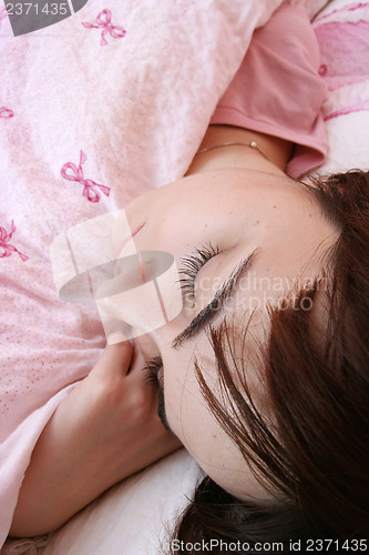 Image of Beautiful young woman sleeping.