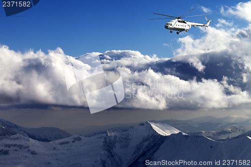 Image of Helicopter in winter mountains