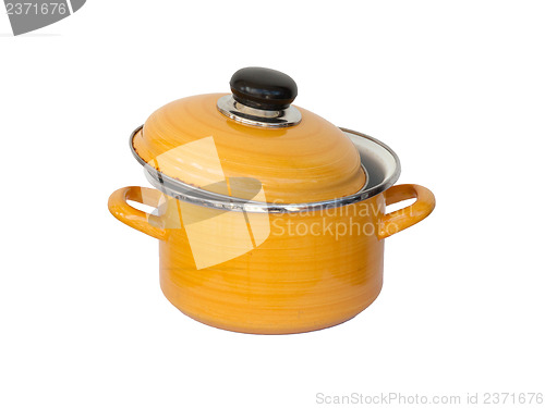 Image of Old yellow metal cooking pot 