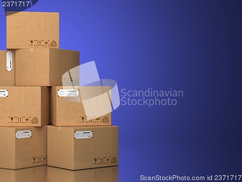 Image of Pile of cardboard boxes on a blue background.