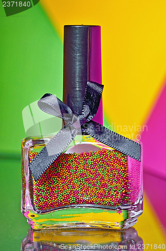 Image of Bottle with colorful nail polish 